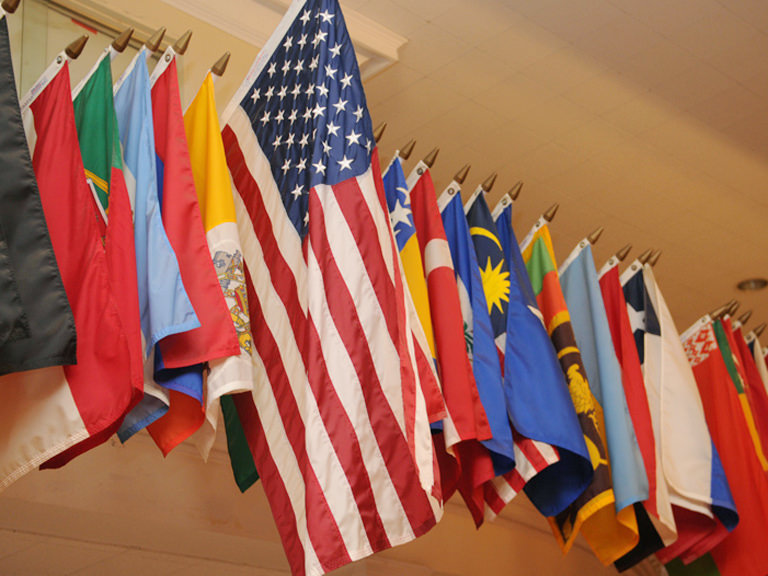Flags of different countries in Smith Auditorium.