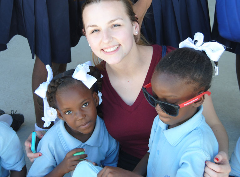A student participates in a service-immersion trip to Haiti