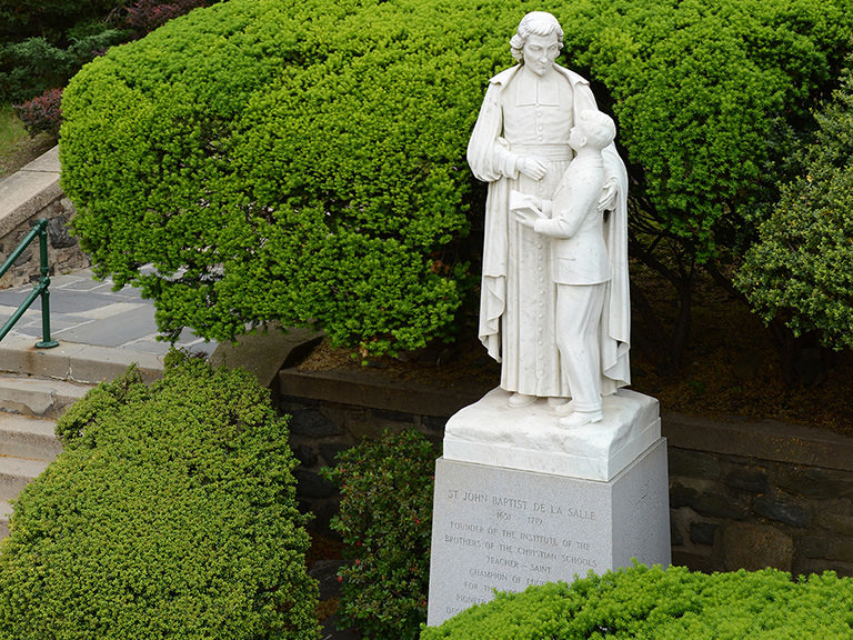De La Salle statue on Manhattan College quad