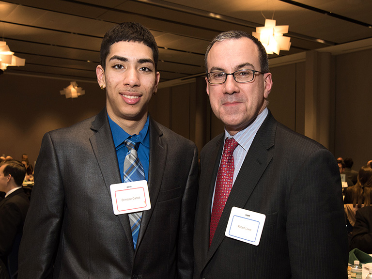 Robert Lowe '86 (left) with Christian Cabral '19.