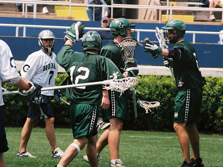 The 2002 Manhattan College men's lacrosse team in action