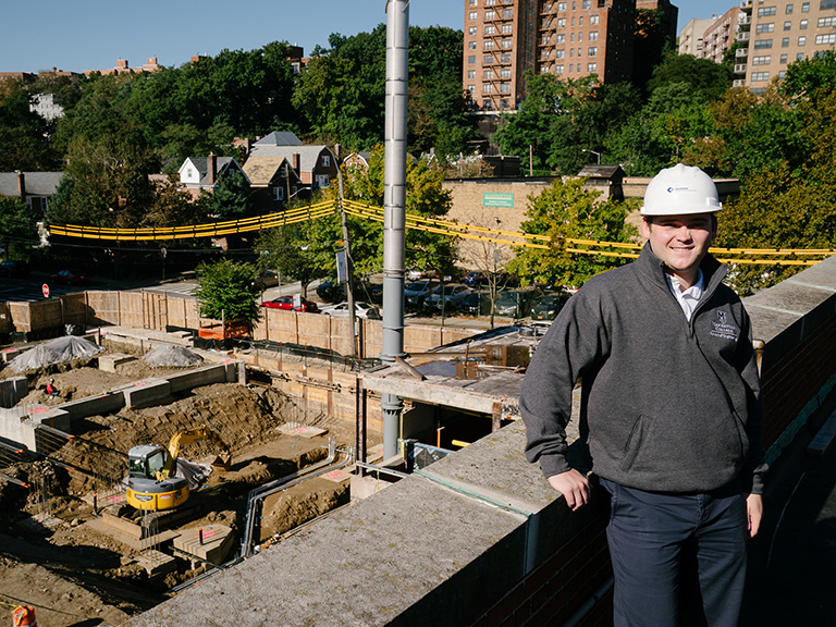Matt McMorrow '19 at construction site at Higgins Center